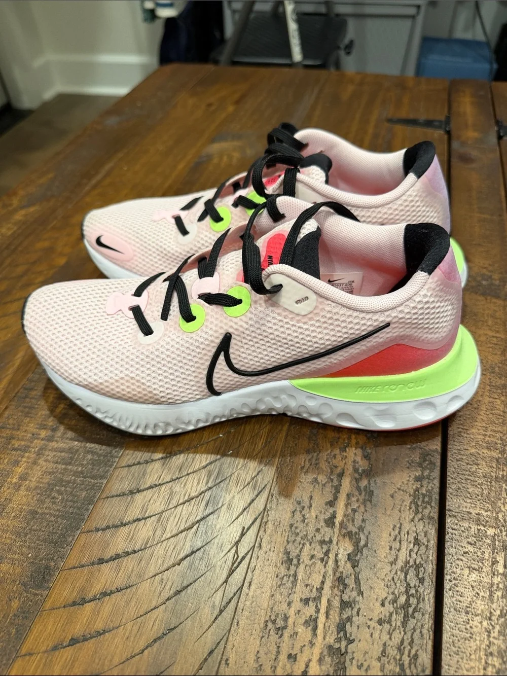 Nike Pink Mesh Running Sneakers with Black Swoosh and Neon Accents